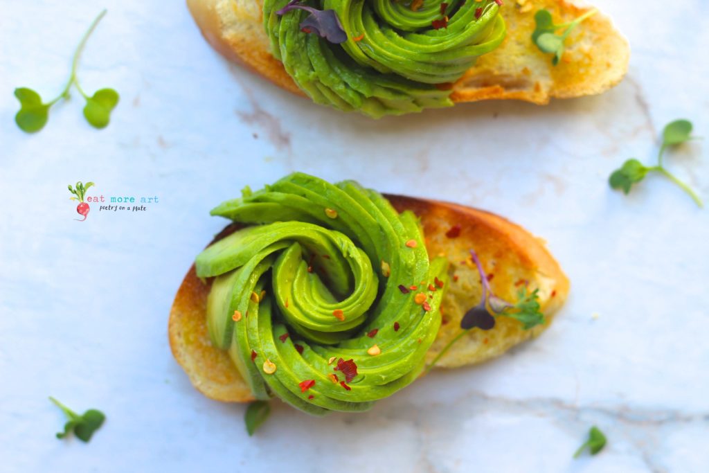 A toast topped with avocado rose