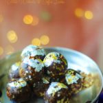 A side shot of dates walnuts coffee laddu with bokeh in the background