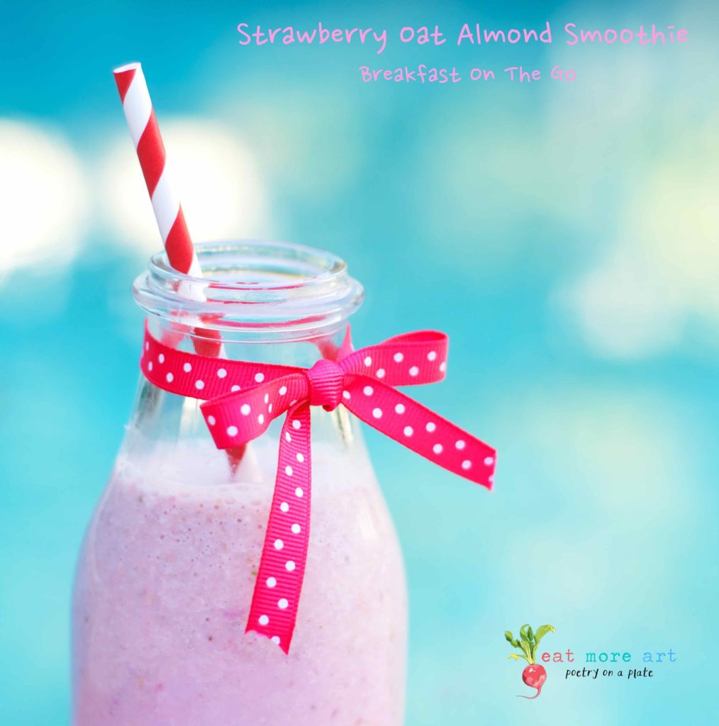 A side shot of Strawberry Oats Almond Smoothie in a bottle 