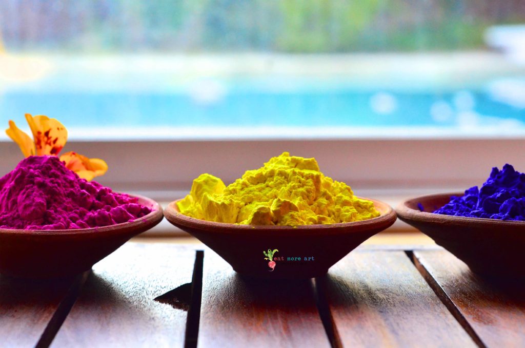 a side shot of various holi colors