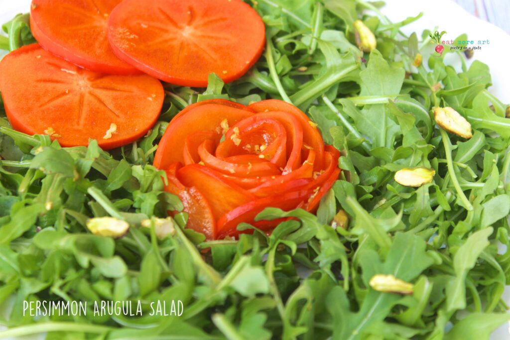 A closeup side shot of Persimmon Arugula Salad