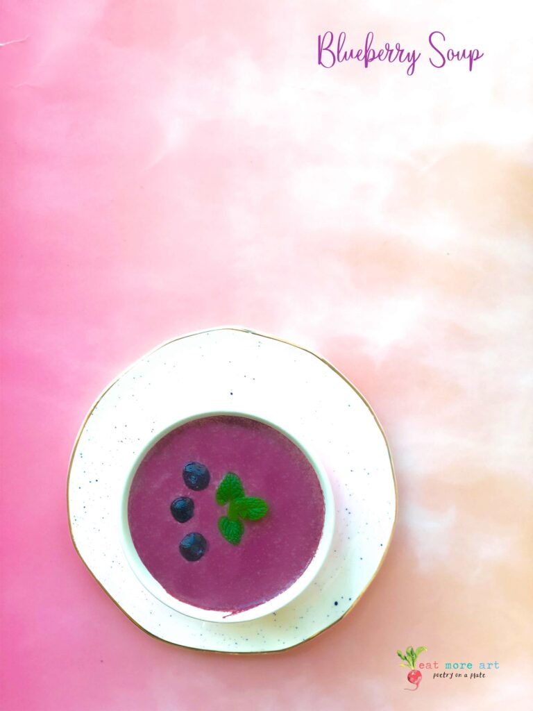 An overhead shot of chilled blueberry soup 
