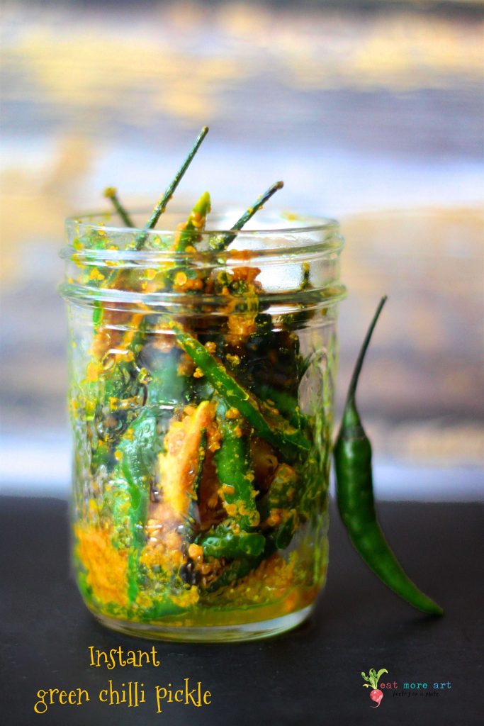 A side shot of a jar of instant green chilli pickle