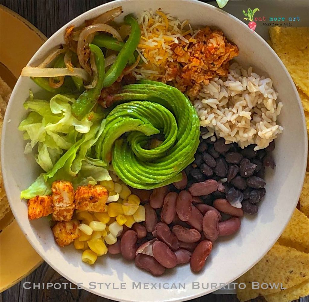 An overhead, closeup shot of chipotle style mexican burrito bowl