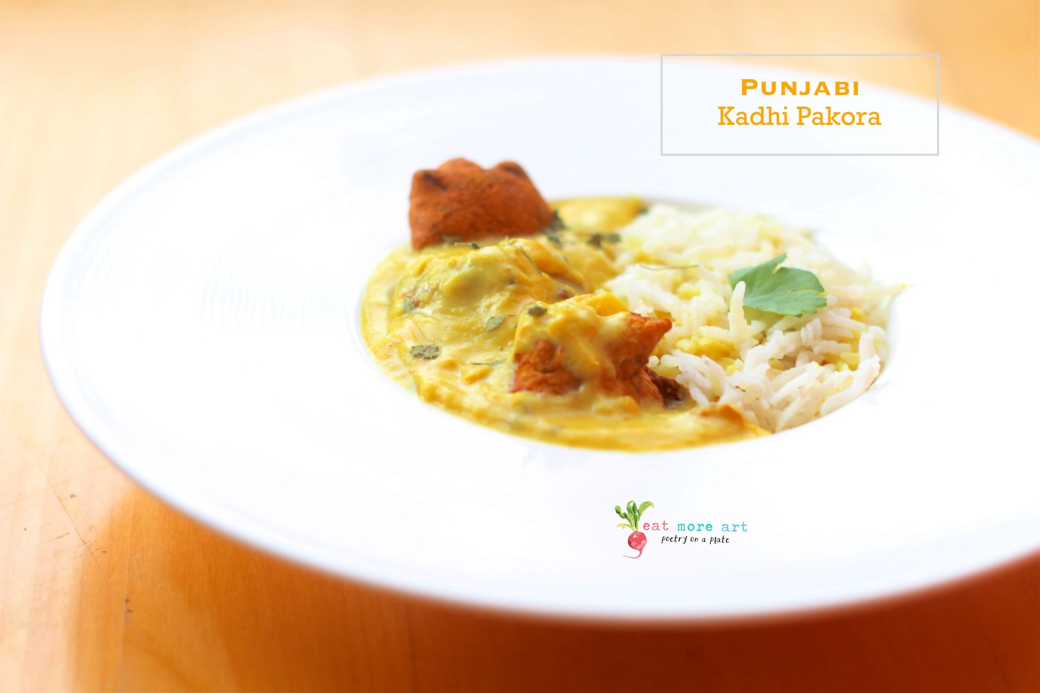 a plate of punjabi kadhi pakora