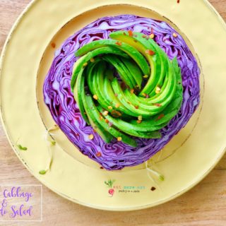 an overhead shot of purple cabbage avocado salad