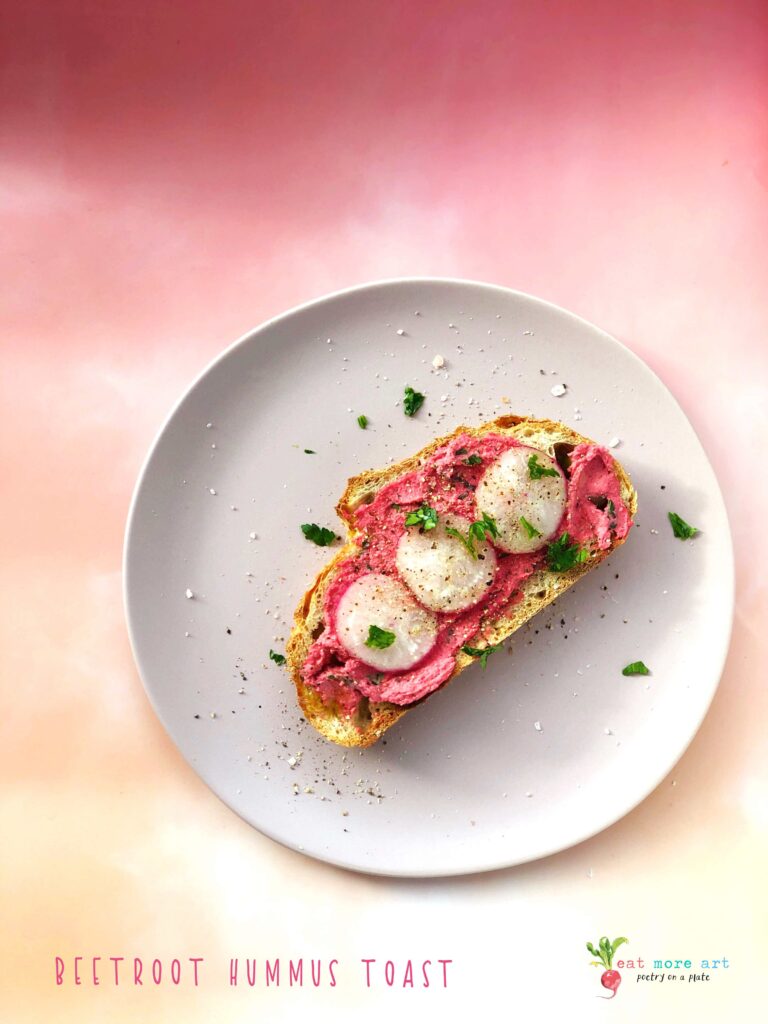 An overhead shot of Beetroot Hummus Toast topped with radishes