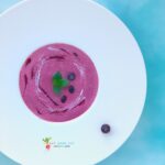 An overhead shot of chilled blueberry soup