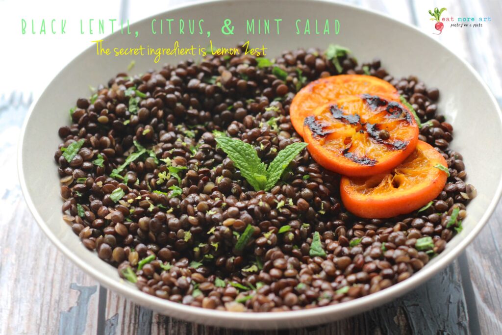 A side shot of black lentil, citrus & mint salad